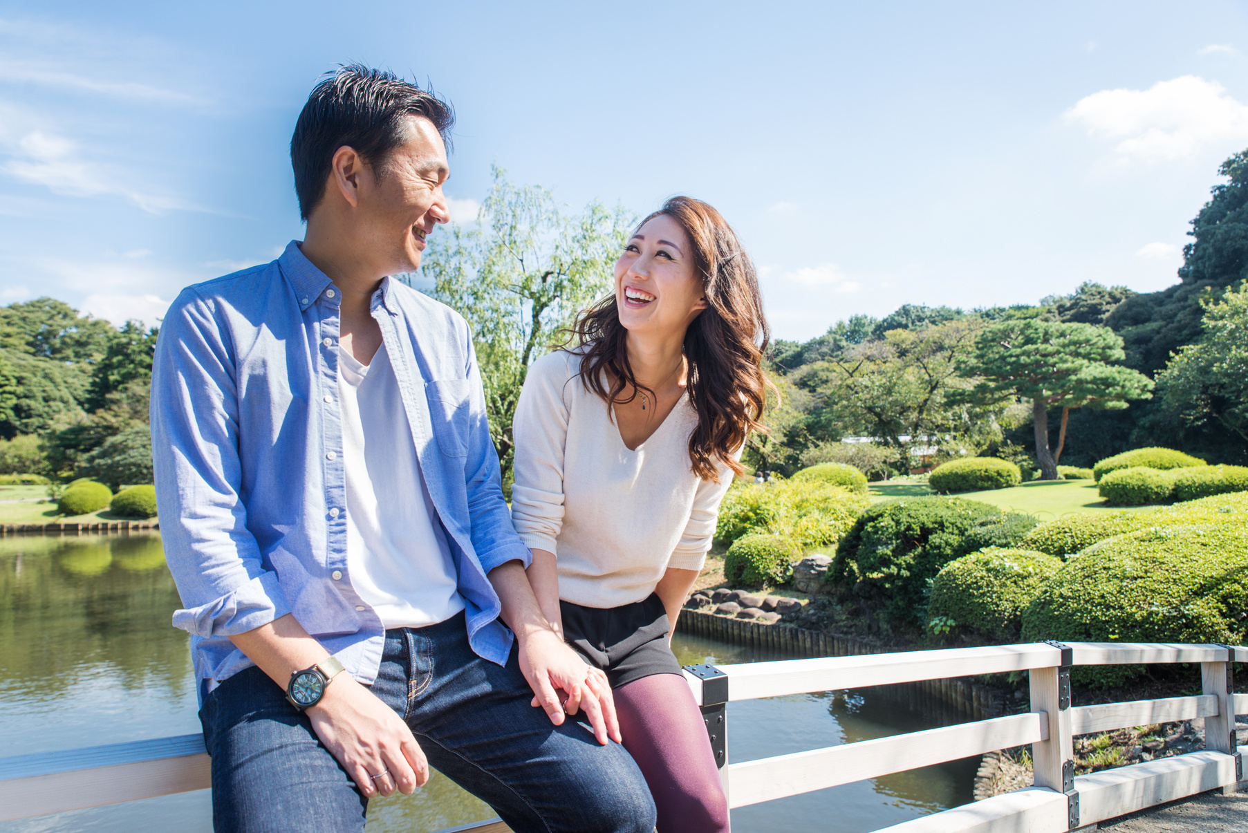 Beautiful Asian Couple Dating in a Park